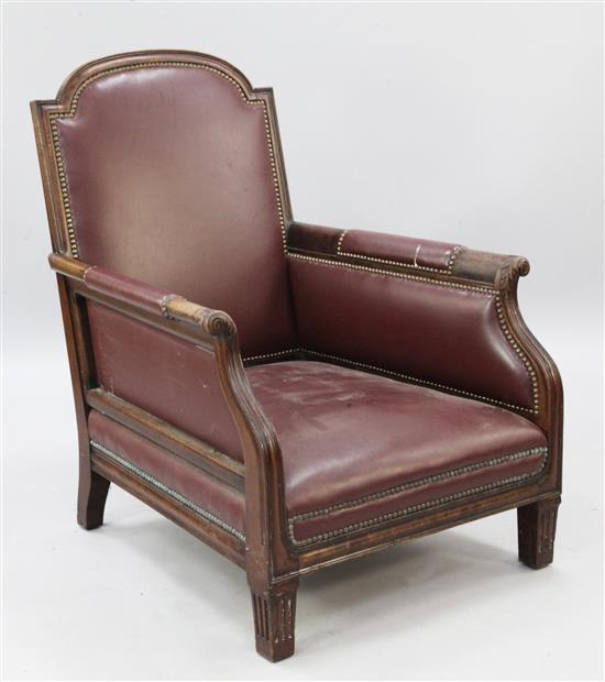 An Edwardian red leather upholstered mahogany framed armchair,